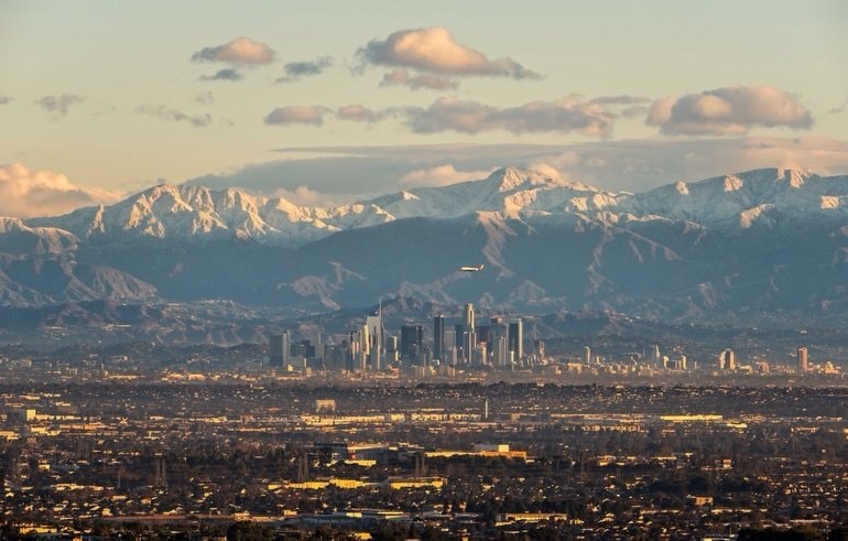 City skyline with mountains at sunset (photo 4 of 4)