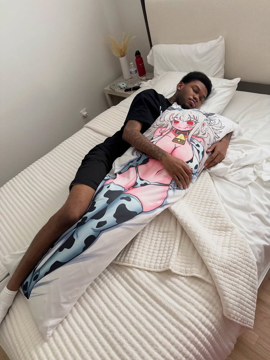 sleeping with anime body pillow