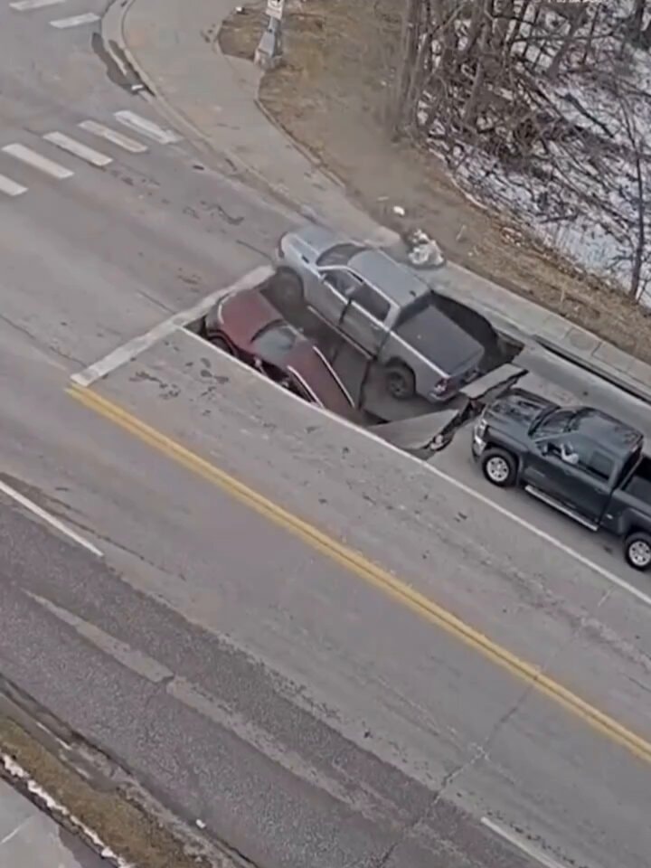 large sinkhole on street