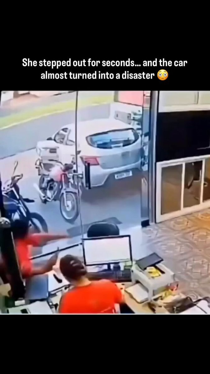Car nearly hits desk in near-miss