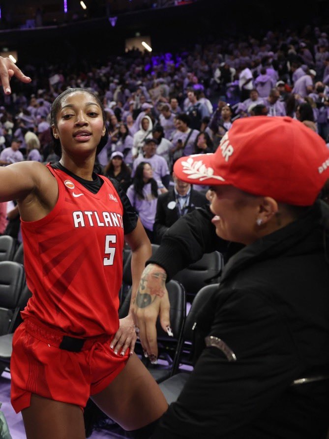 Angel Reese and Latto at WNBA Finals Game 2 (photo 4 of 4)