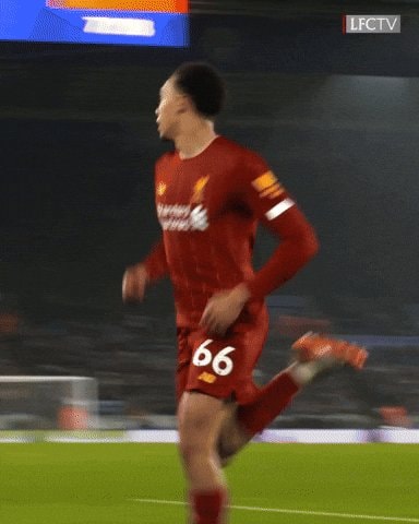 Soccer player number 66 running
