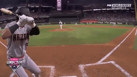 Baseball player batting from umpire view