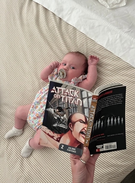 Baby reading Attack on Titan