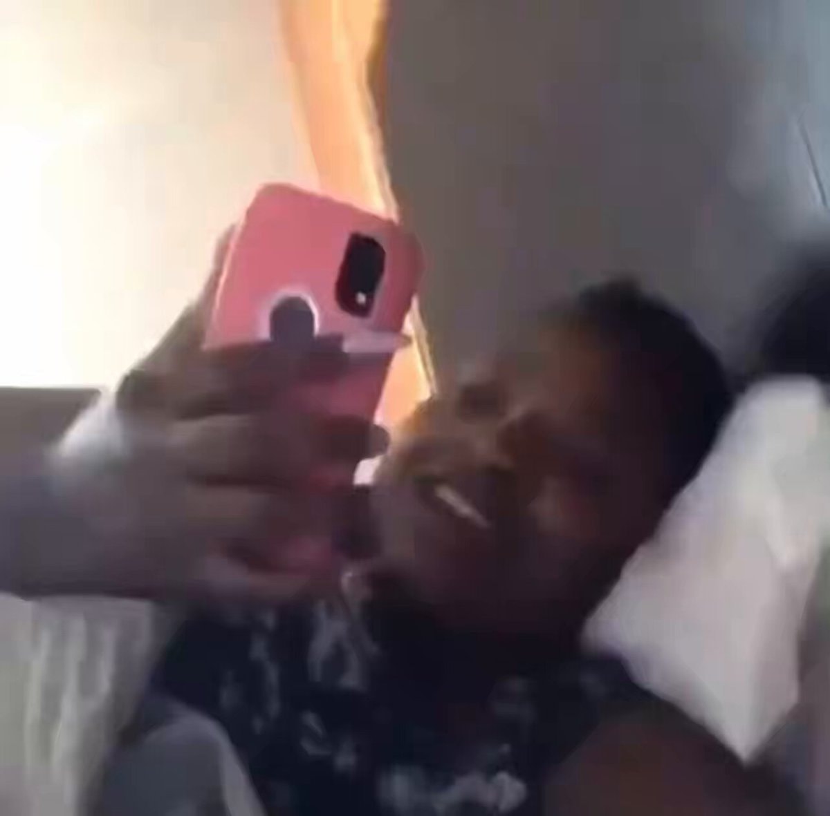 pink phone selfie moment