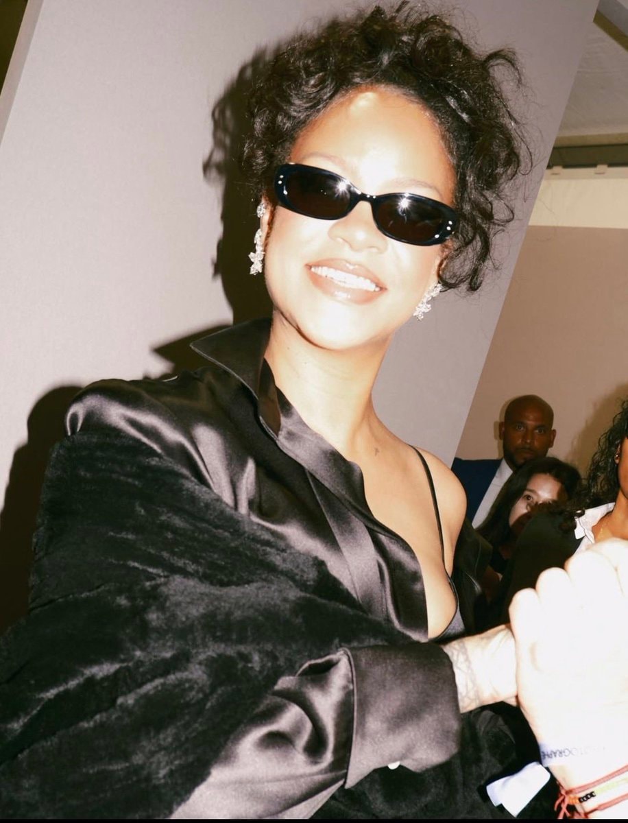Rihanna in black satin