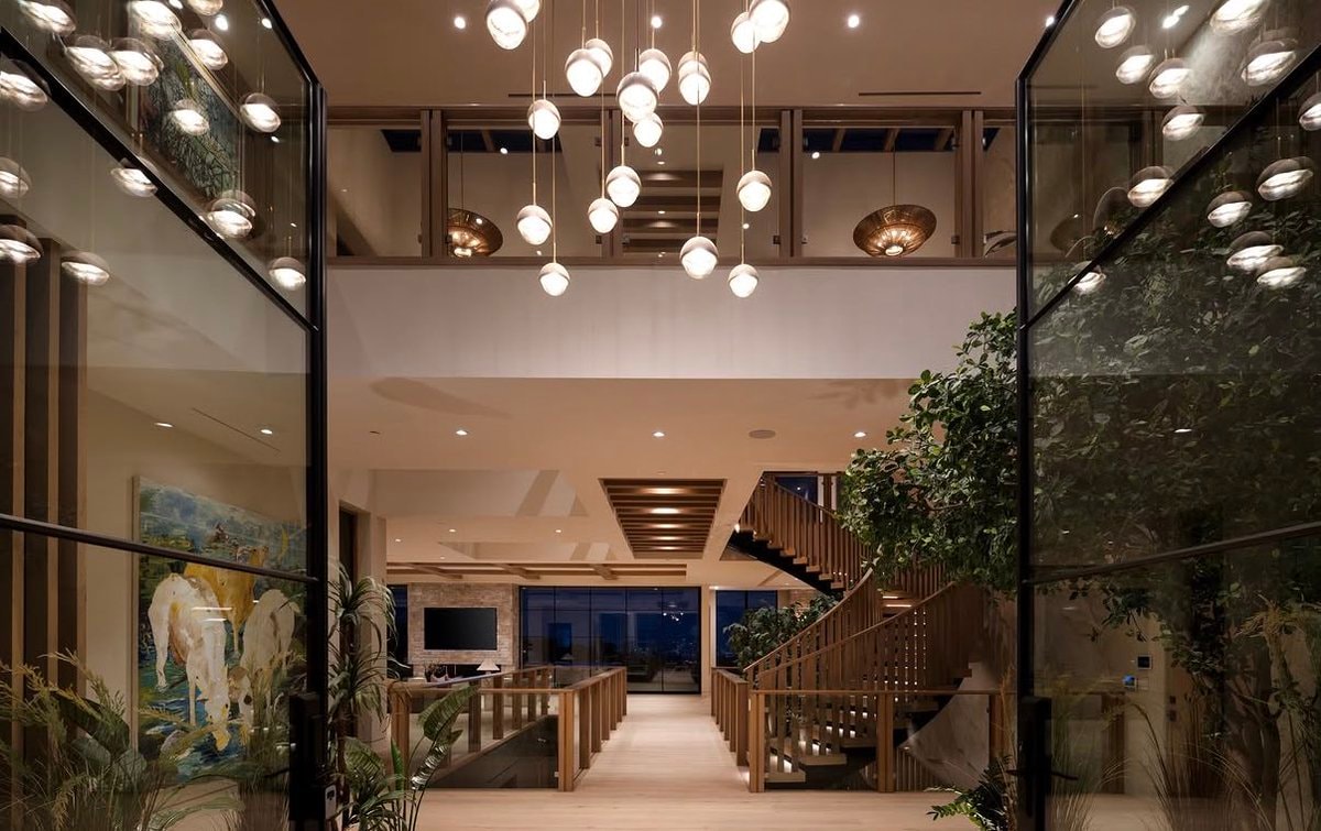 luxury home at dusk (photo 3 of 4)