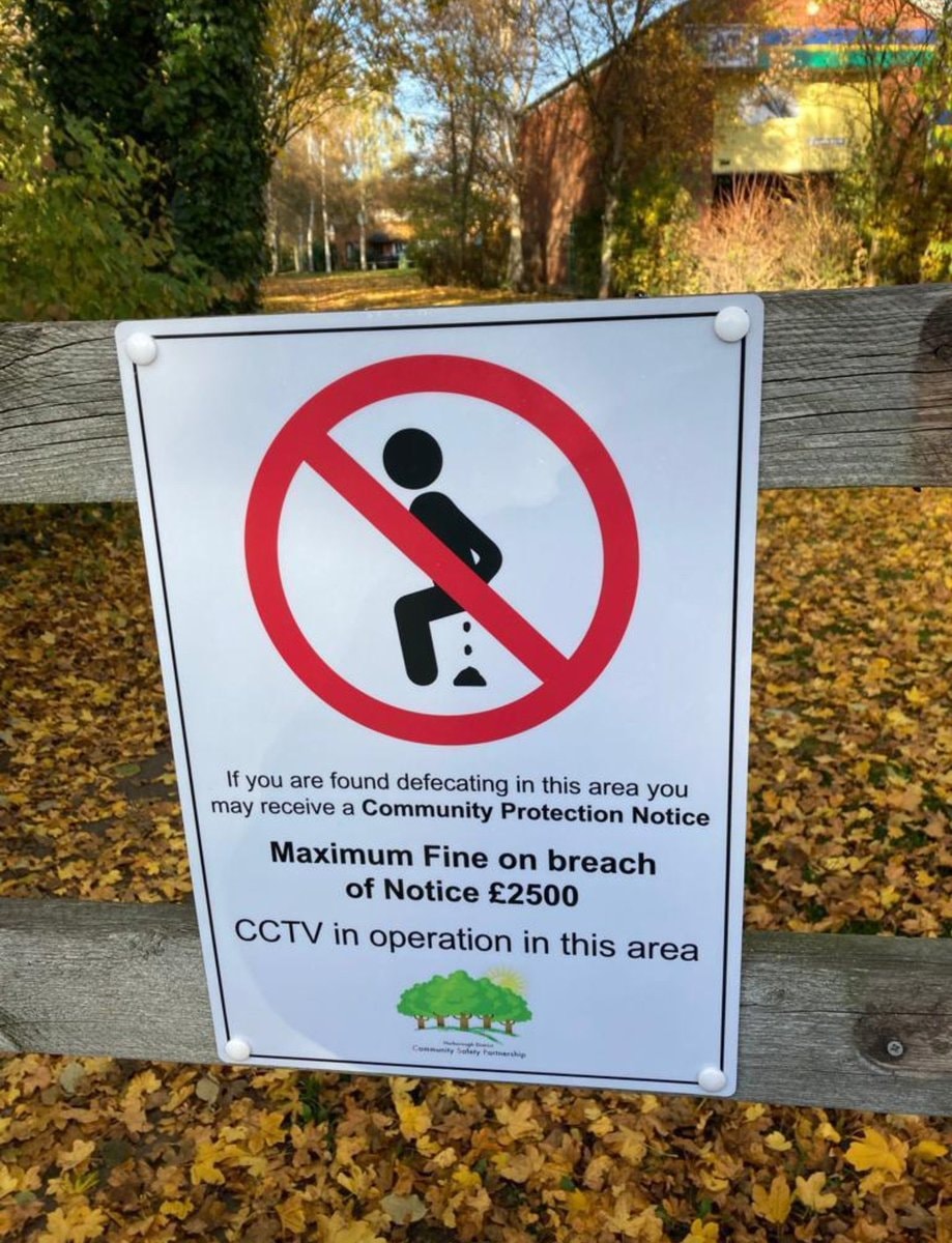 London park defecation fine sign