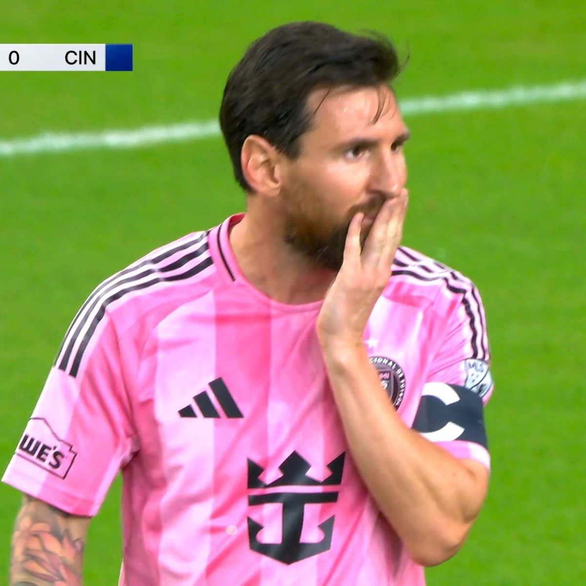 Lionel Messi in pink jersey