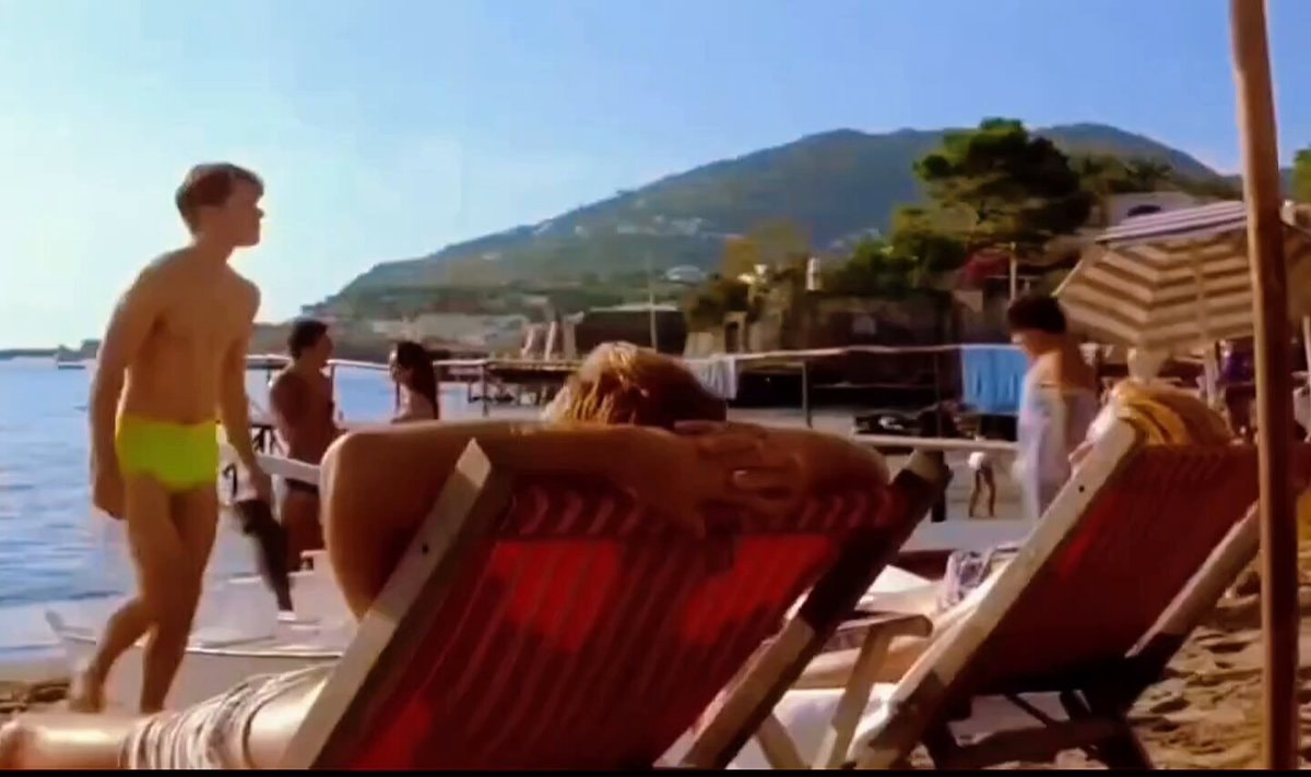 Young man on beach vs Damon Law Paltrow