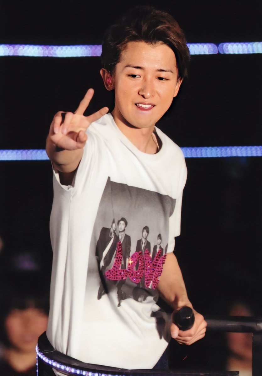 young man on stage peace sign (photo 2 of 4)