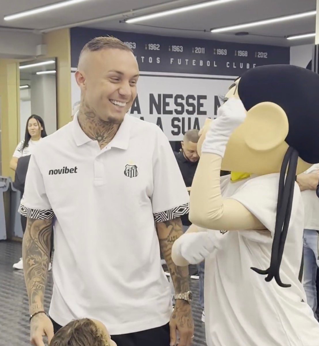 celebratory moment with mascot