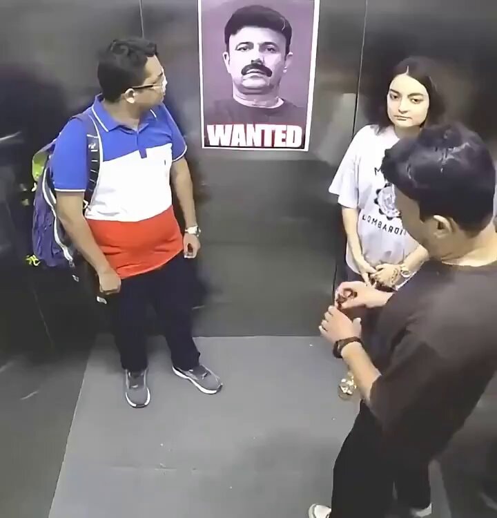 Elevator wanted poster awkward moment