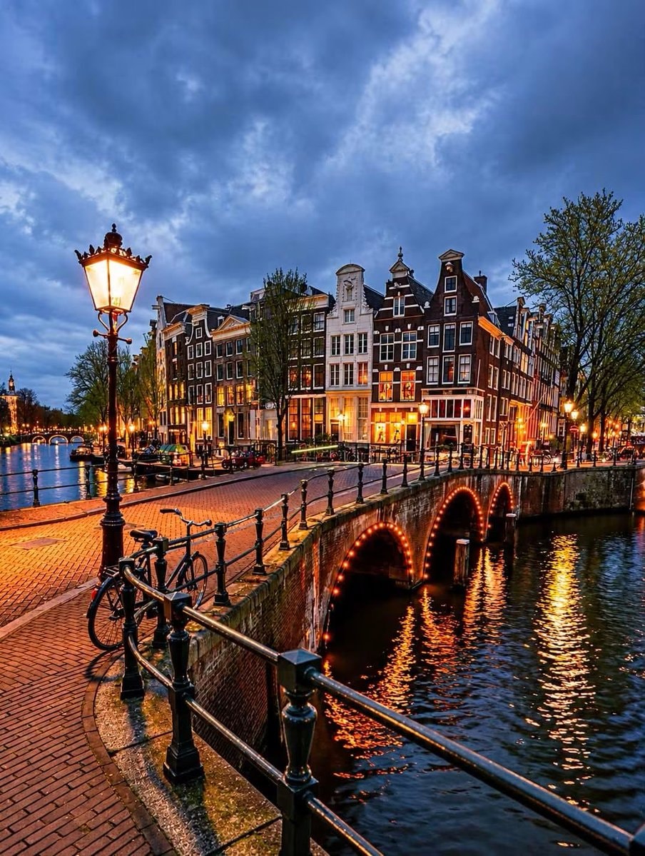 Amsterdam canal bridge at dusk Amsterdam canal bridge at dusk