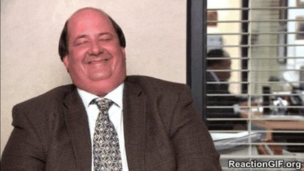 Man in suit laughing heartily Man in suit laughing heartily