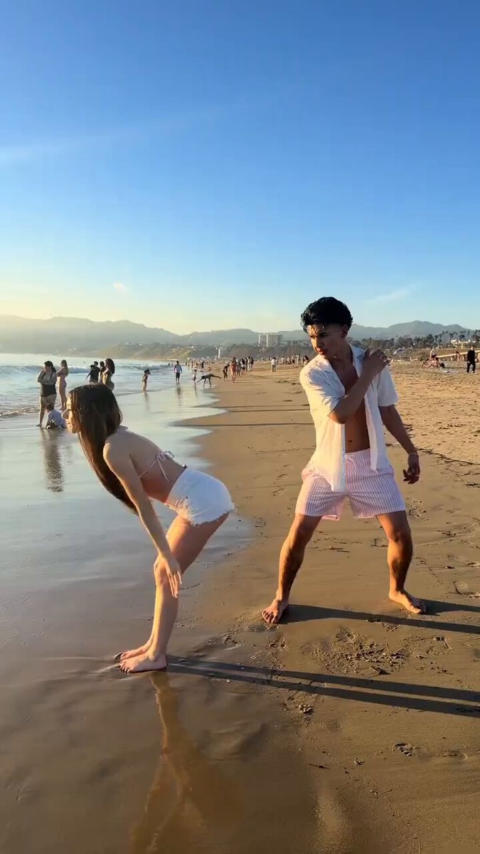 Couple on beach at sunset