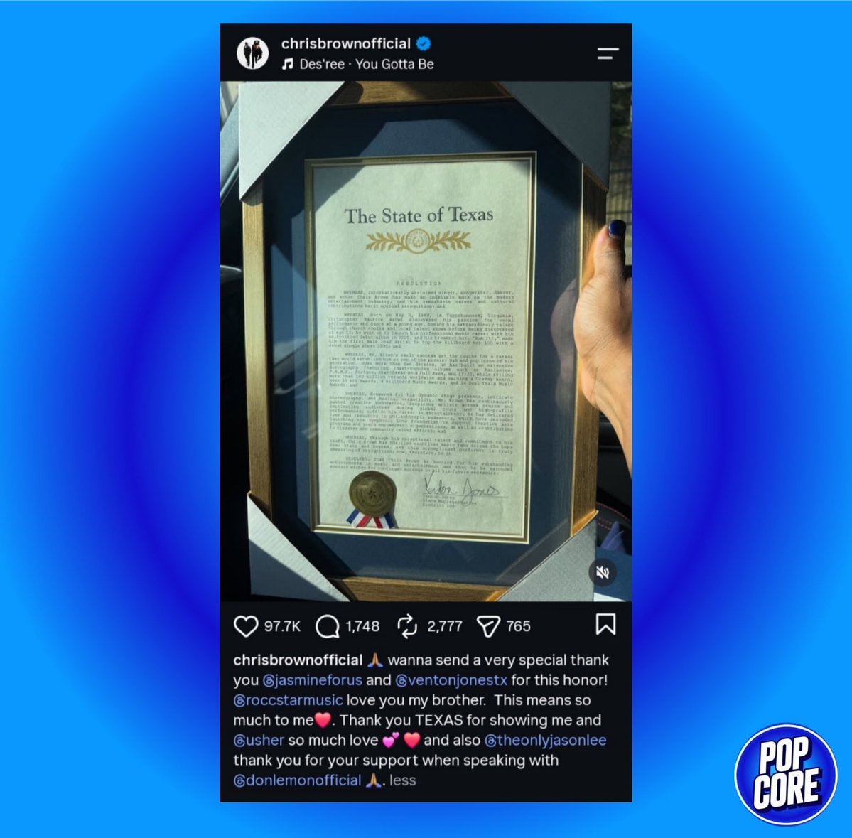 Chris Brown holds The State of Texas RESOLUTION