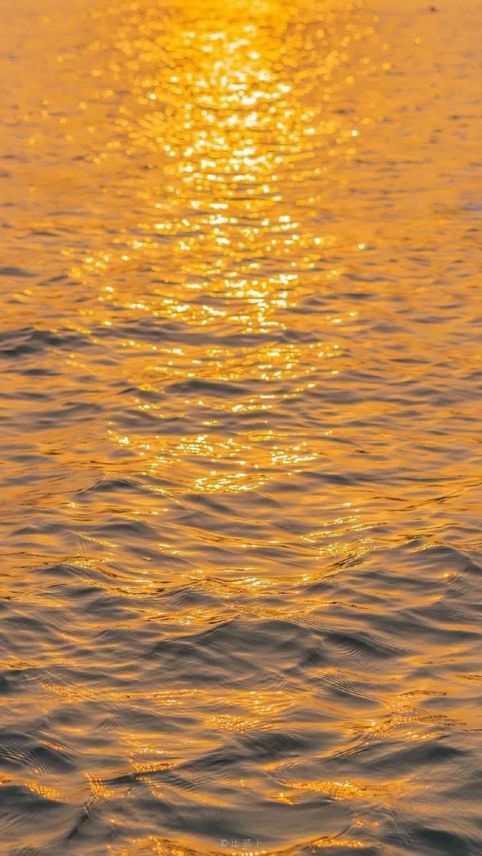 ocean water glittering in the sun (photo 4 of 4)