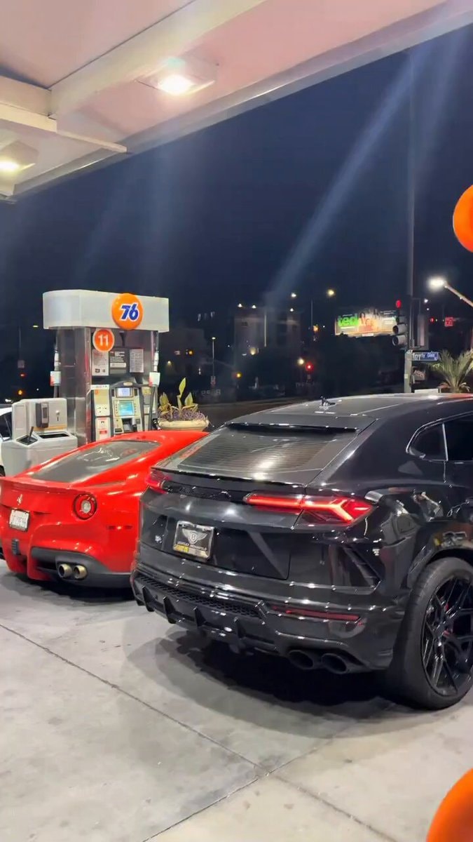 luxury cars at gas station luxury cars at gas station