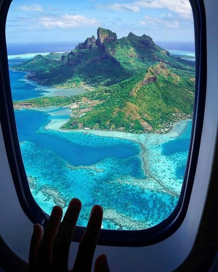 Island looks like Peter Pan from plane Island looks like Peter Pan from plane