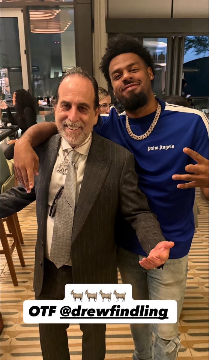 Quinn Cook gifts Drew Findling OTF chain (photo 2 of 2)