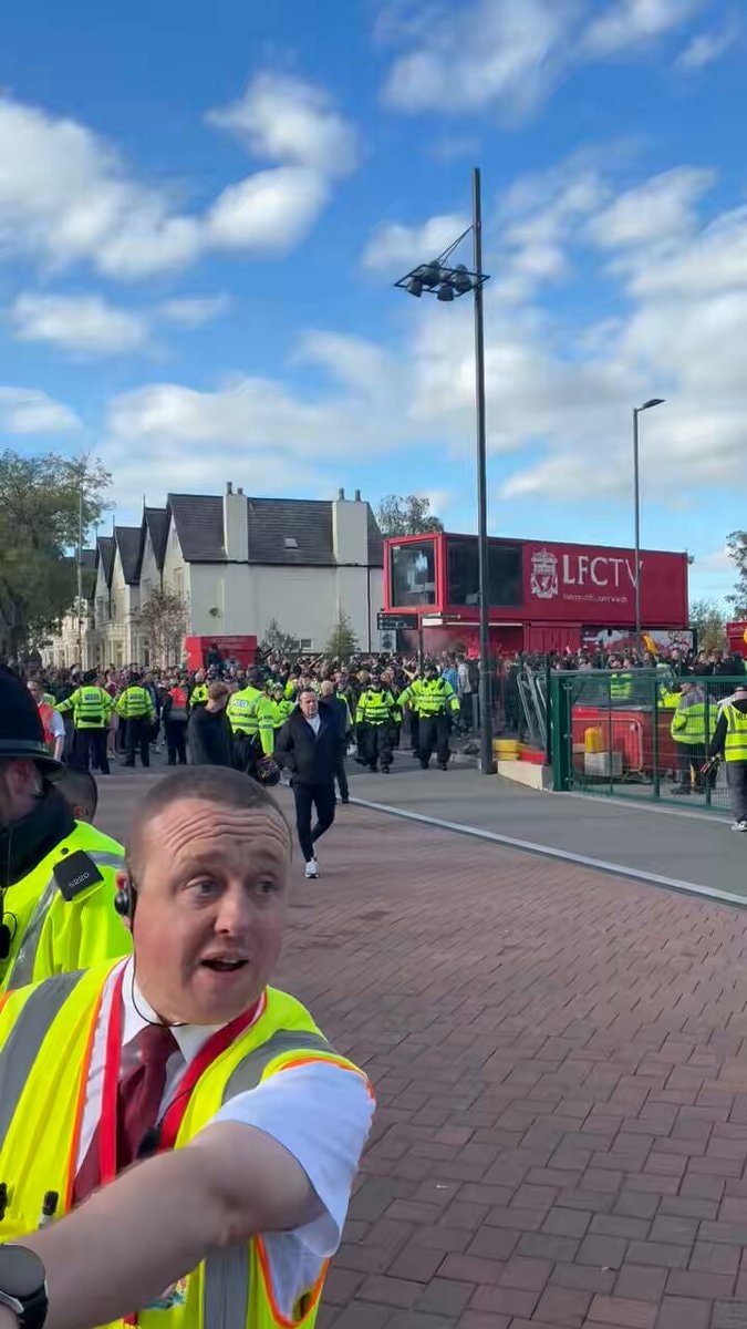 Manchester City fans escorted at Anfield