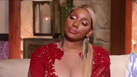 Blonde in red lace dress interview GIF
