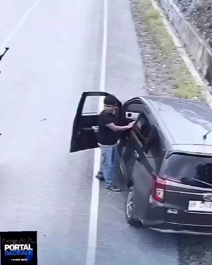 Man enters dark car roadside