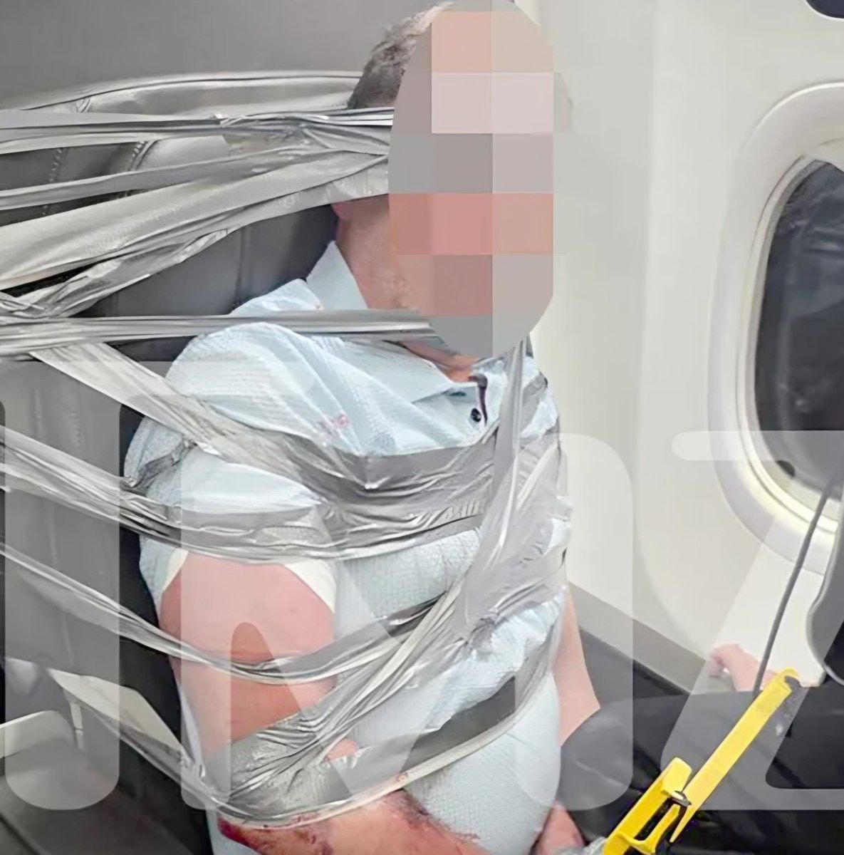 American Airlines passenger duct-taped seat American Airlines passenger duct-taped seat