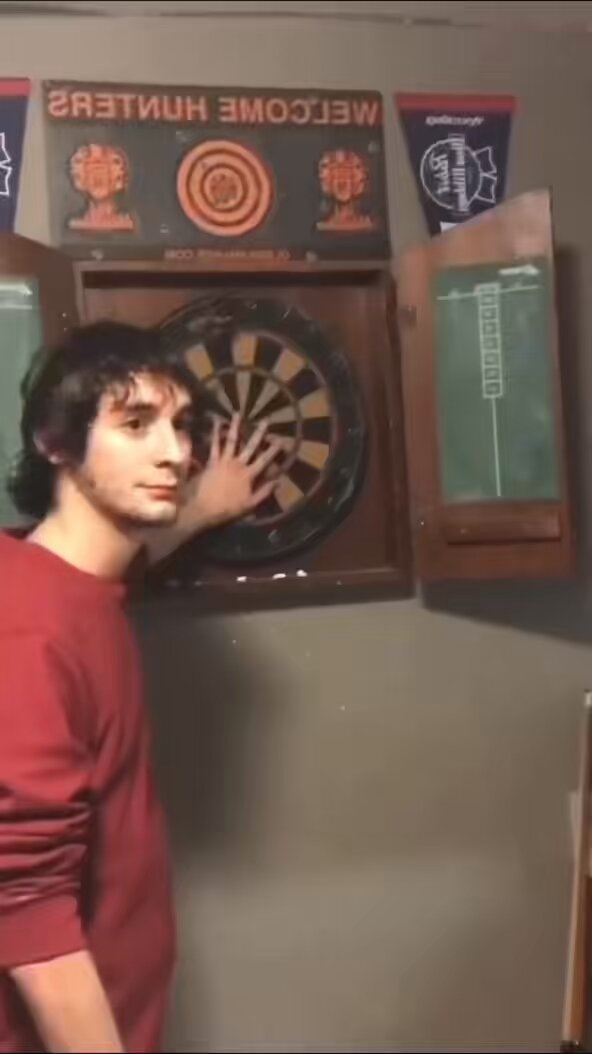 dartboard moment with welcome hunters sign