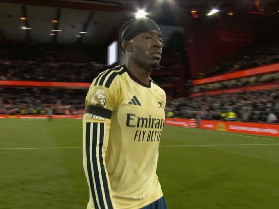 soccer player in yellow jersey