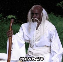 Older man in white robe reacting