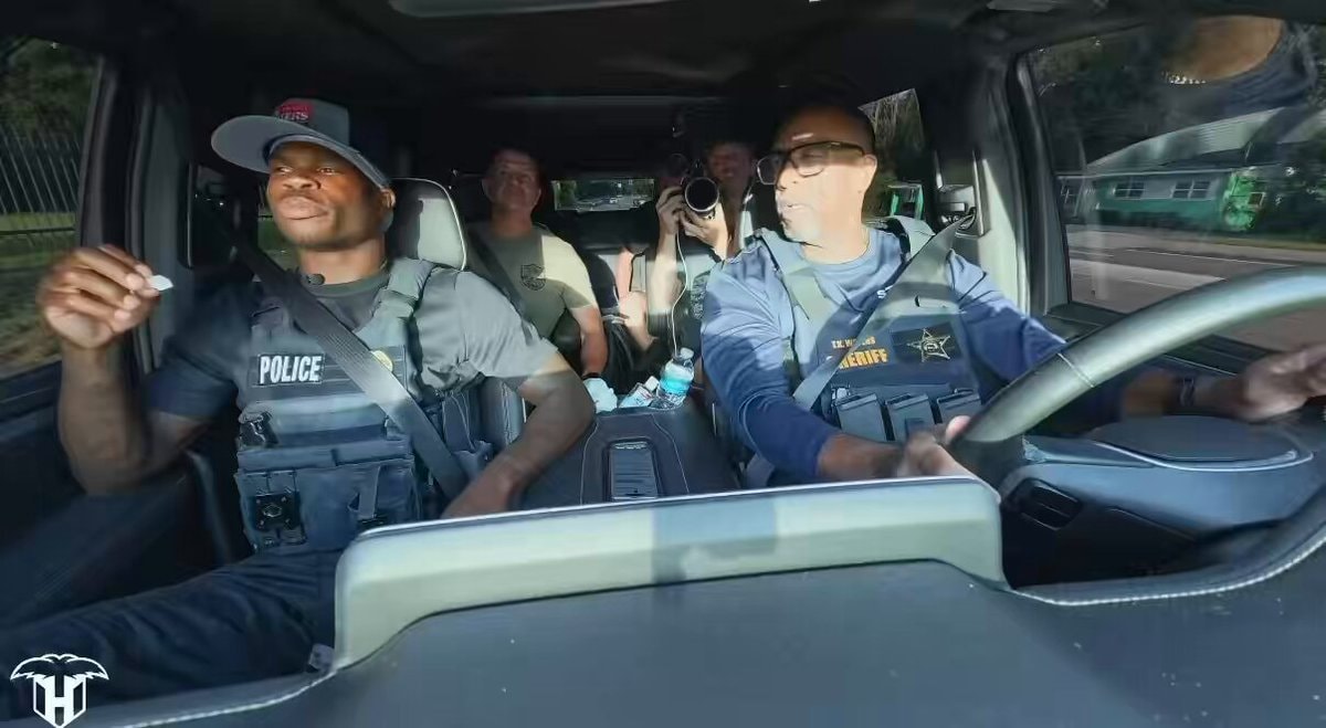 Travis Hunter rides with Jacksonville Sheriff