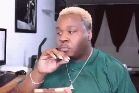 blonde hair hand on chin reaction