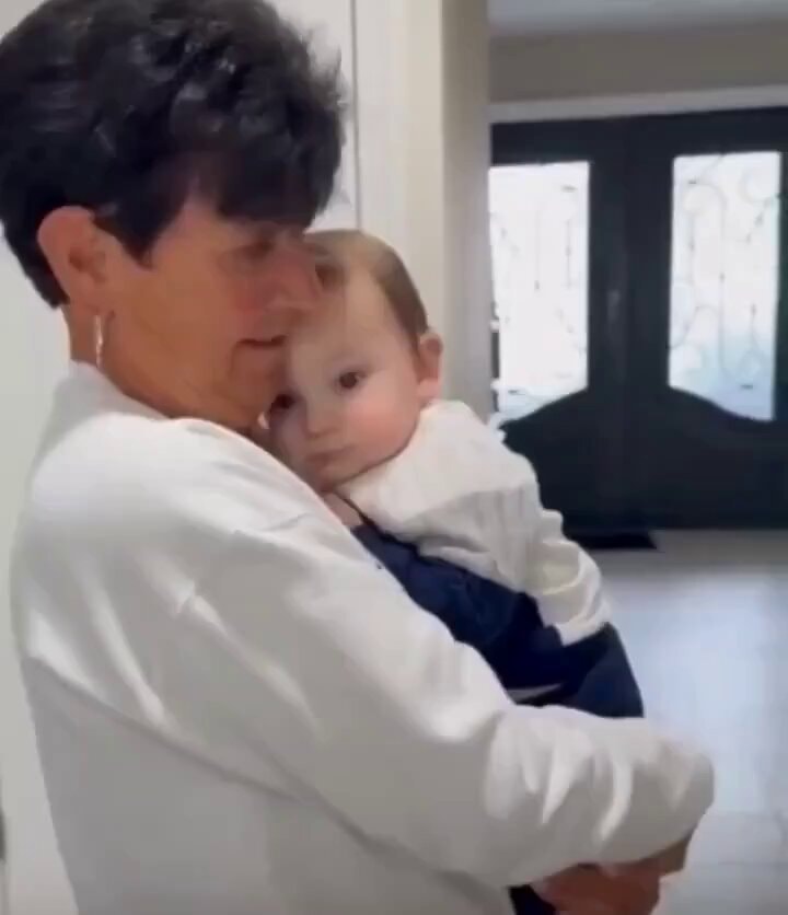 Grandmother holding baby