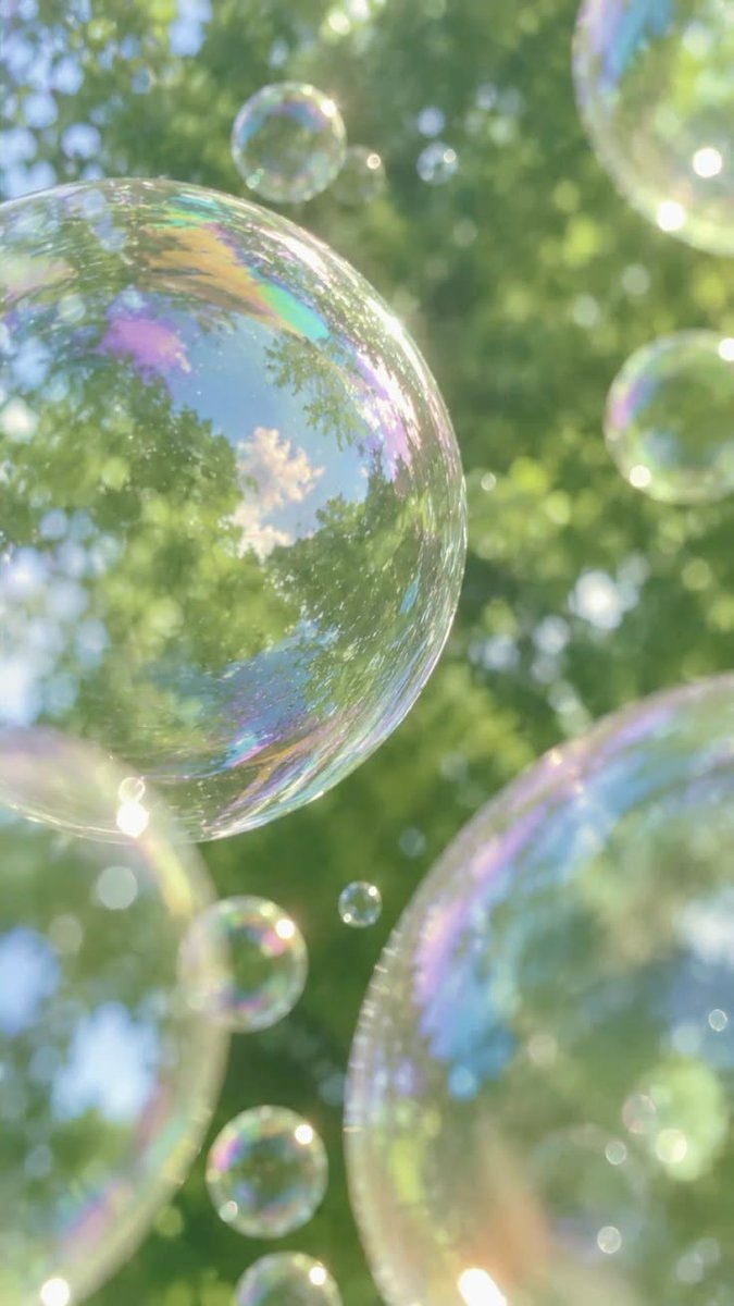 Iridescent bubbles in blue sky ✨ (photo 4 of 4)