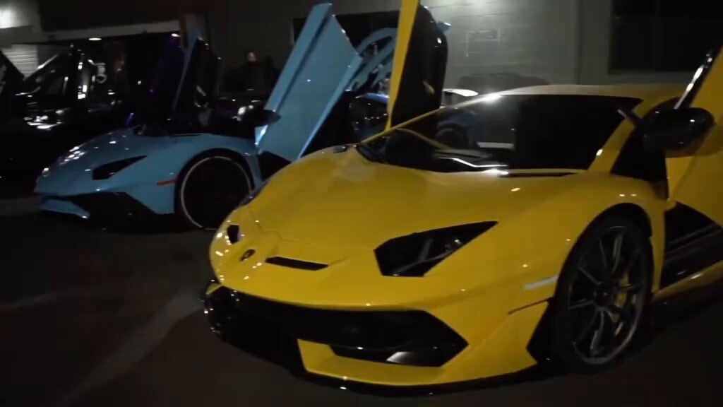 Lamborghinis parked at night