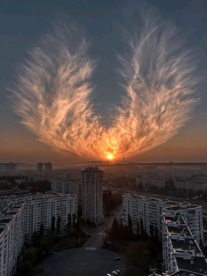 Kyiv sunset wing clouds