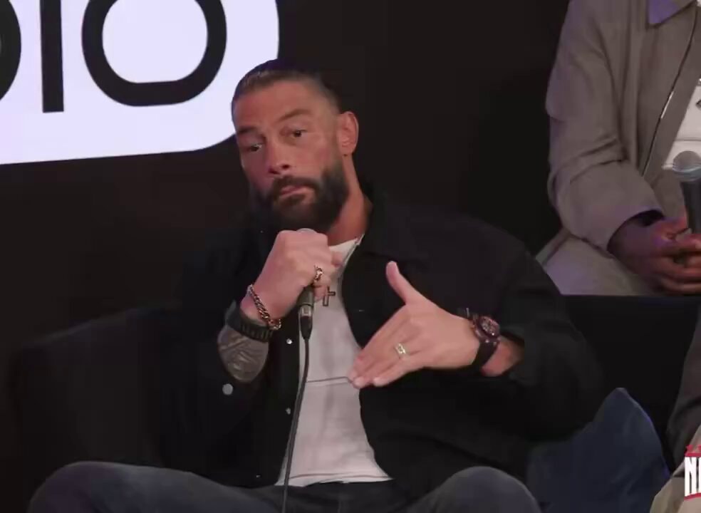 Roman Reigns and 50 Cent Street Fighter press Roman Reigns and 50 Cent Street Fighter press