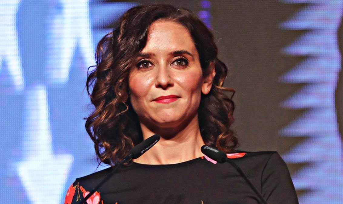 Isabel Díaz Ayuso speaks at podium