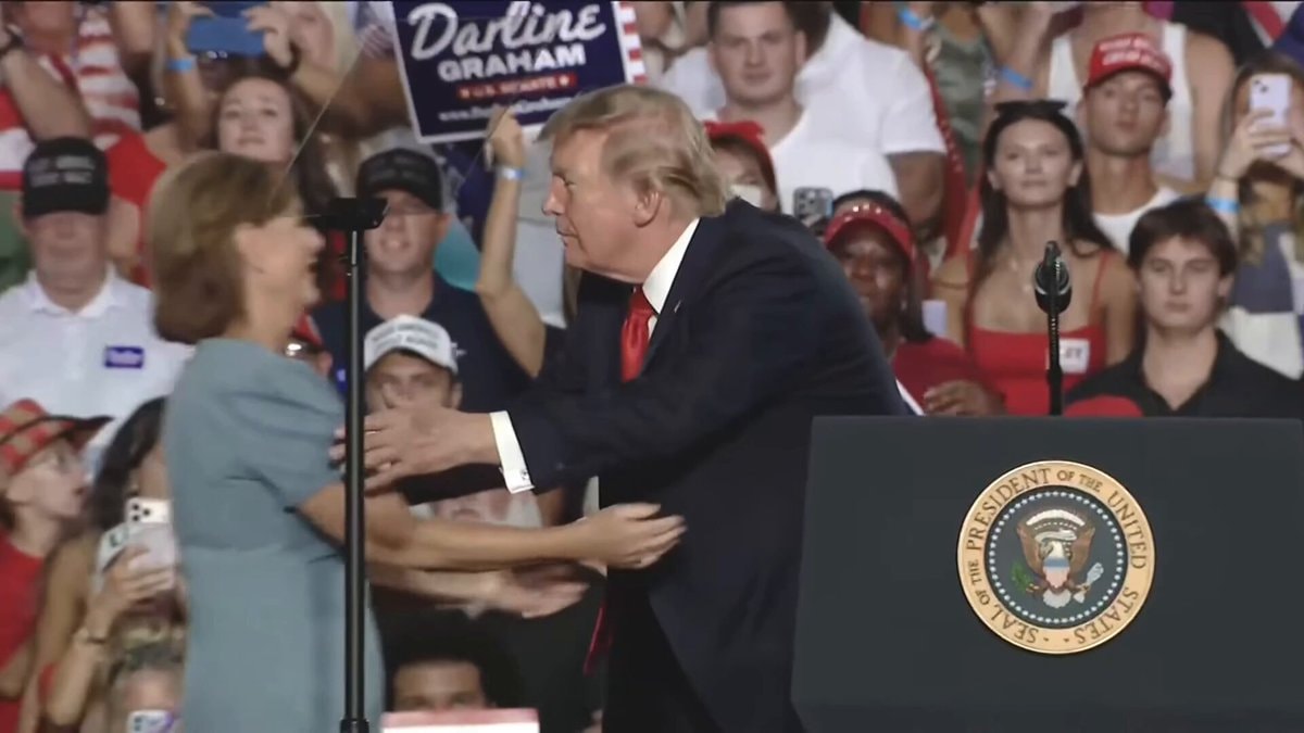 Darline Graham on stage with Trump