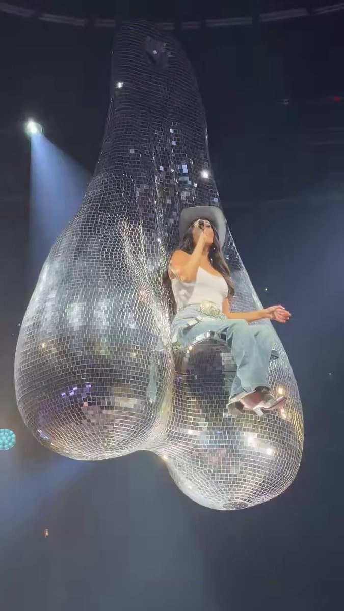 Concert stage prop disco ball buttocks