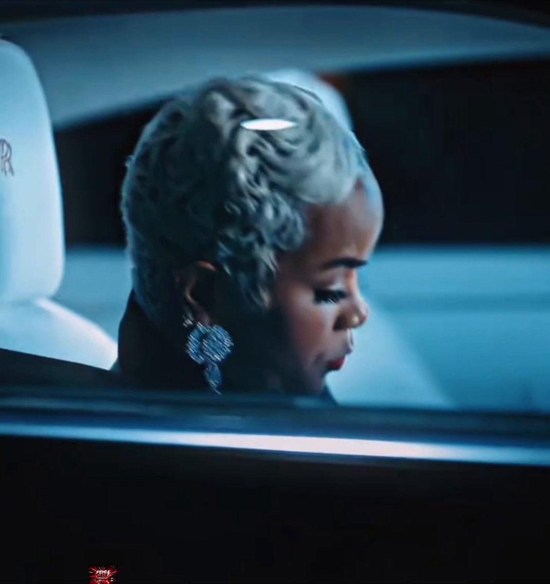 Woman stuck in luxury car RR FEMI