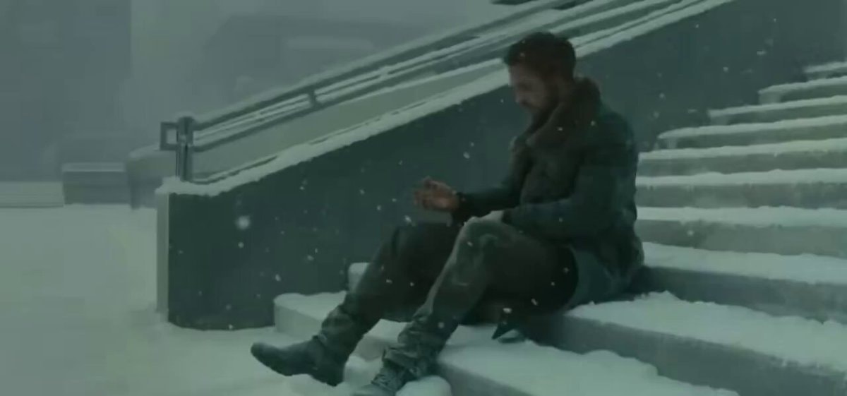 man on snow stairs