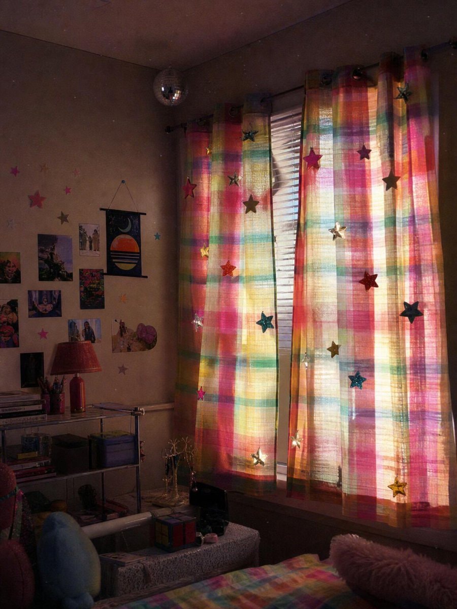 cozy bedroom with star curtains (photo 4 of 4)