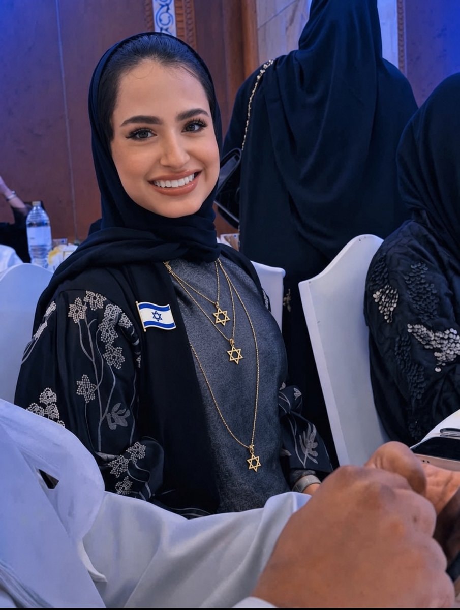 Woman in hijab with Star of David jewelry