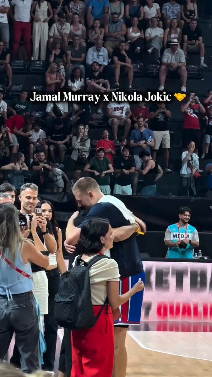 Nikola Jokic Jamal Murray hug Nikola Jokic Jamal Murray hug