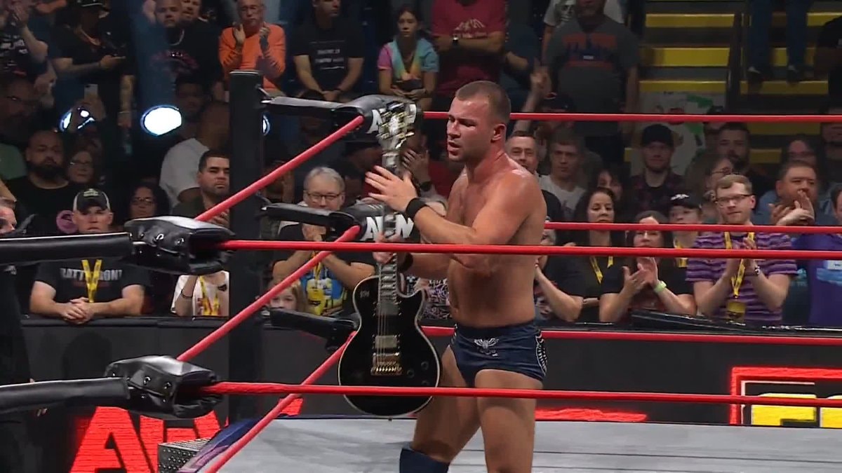 wrestler with electric guitar