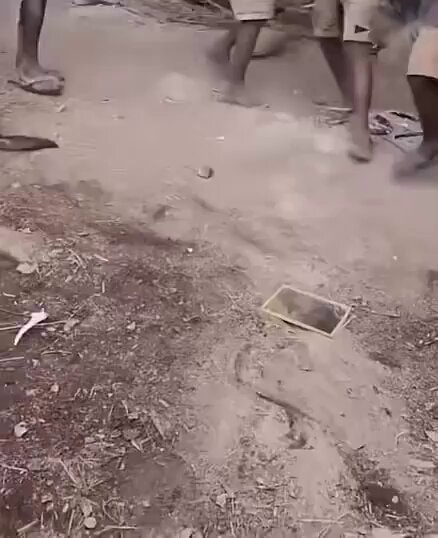 people kicking up dust