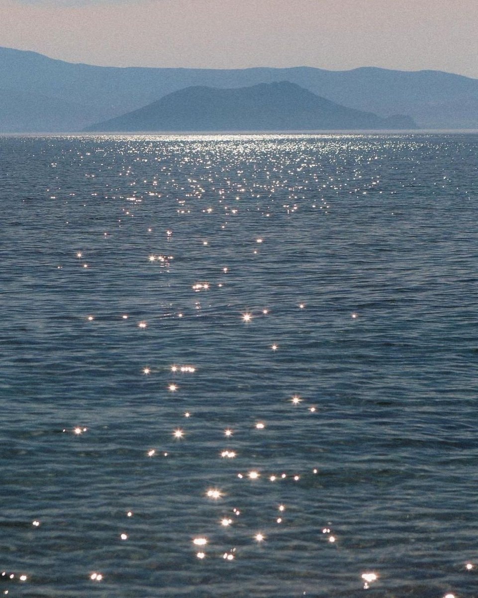 Sun glitter on ocean waves (photo 4 of 4)